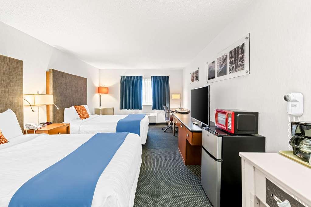 Americas Best Value Inn & Suites - Tahquamenon Country Newberry Room photo